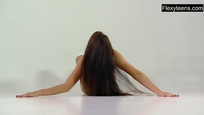 Busty 18-Year-Old Babe Shows Off Her Flexibility In Nude Yoga Video