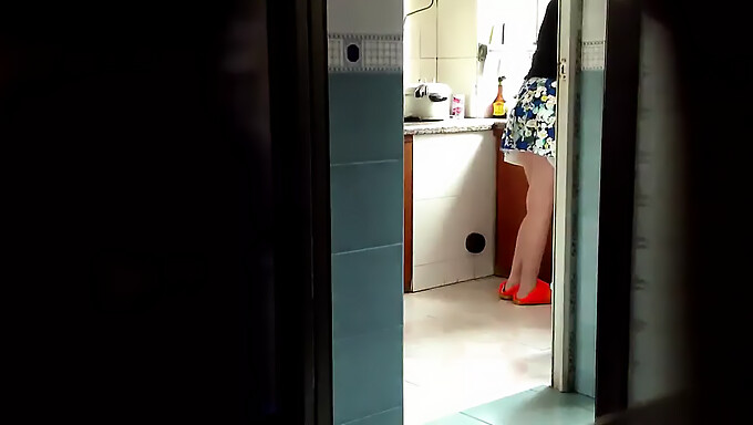 Mature Asian Woman Cooks Up Some Steamy Action In The Kitchen